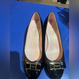 Kate Spade Black Flats with Gold Accents. Floor sample. Never worn.
